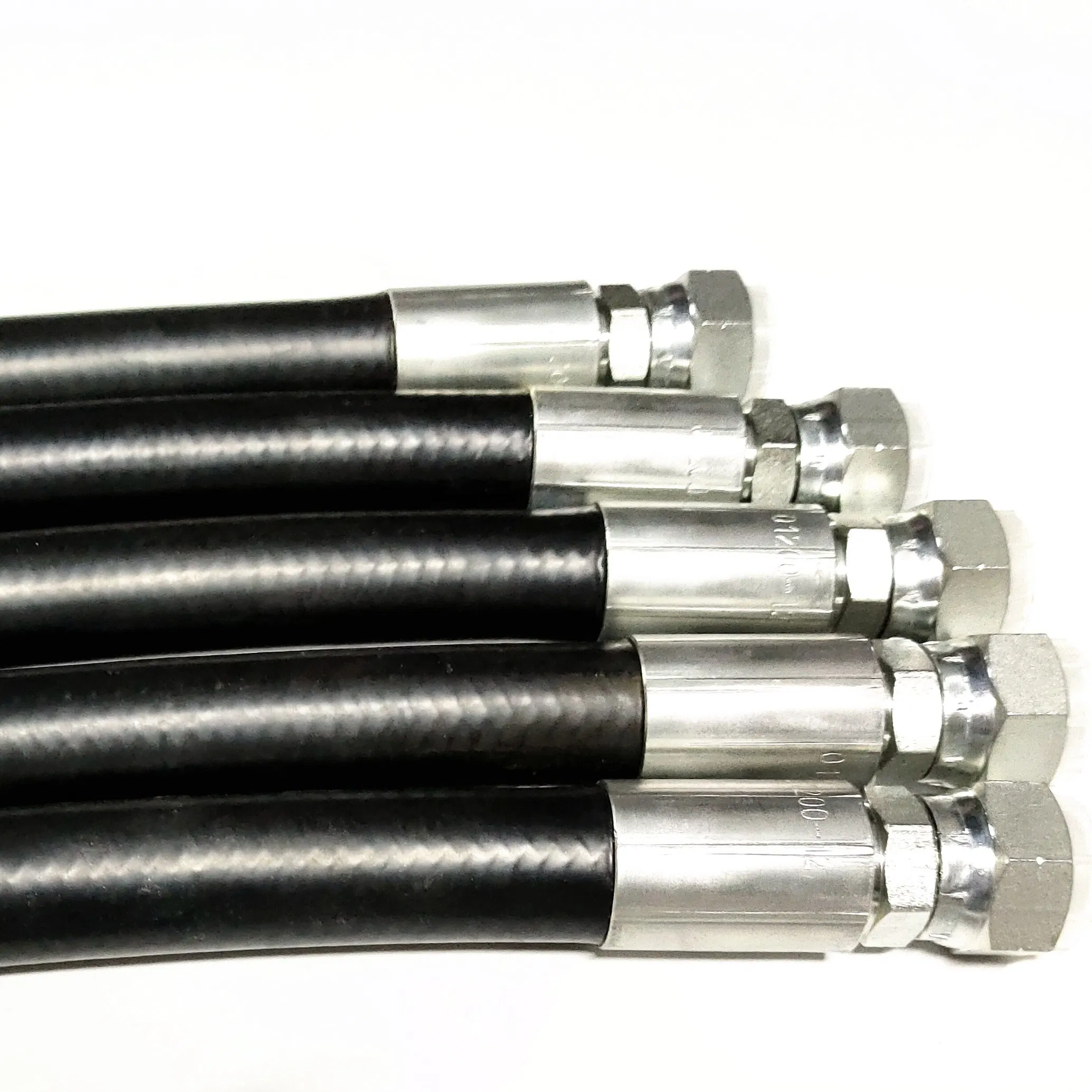 Spiral hose assemblies with fittings